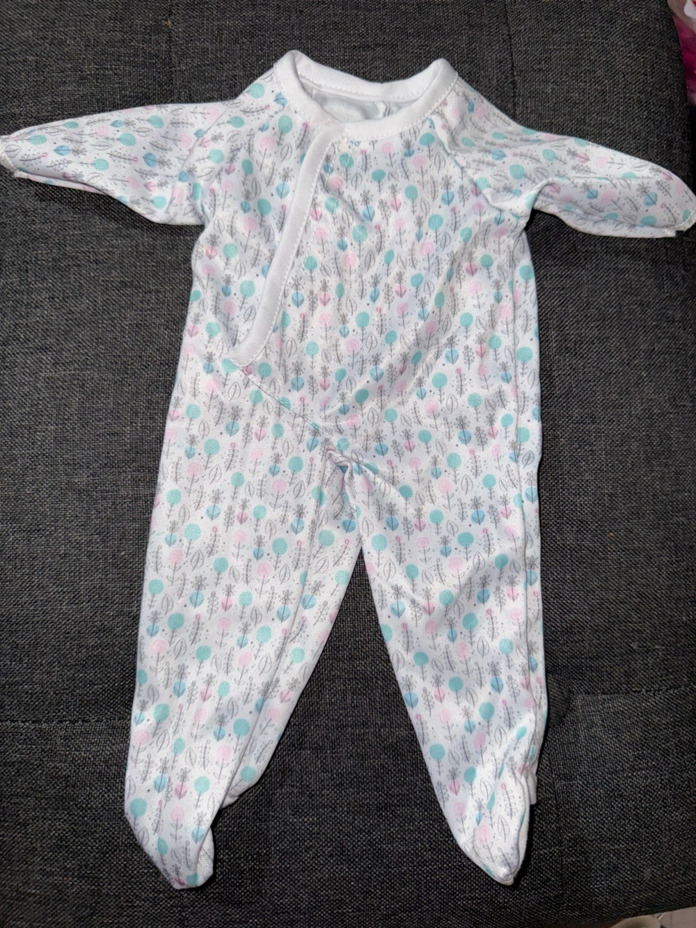 Baby doll white zip up sleeper with multi color dots